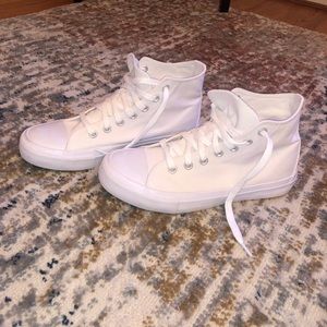 High top sneakers with memory foam insole. White in color. Size 9.5.